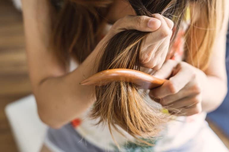 combing hair